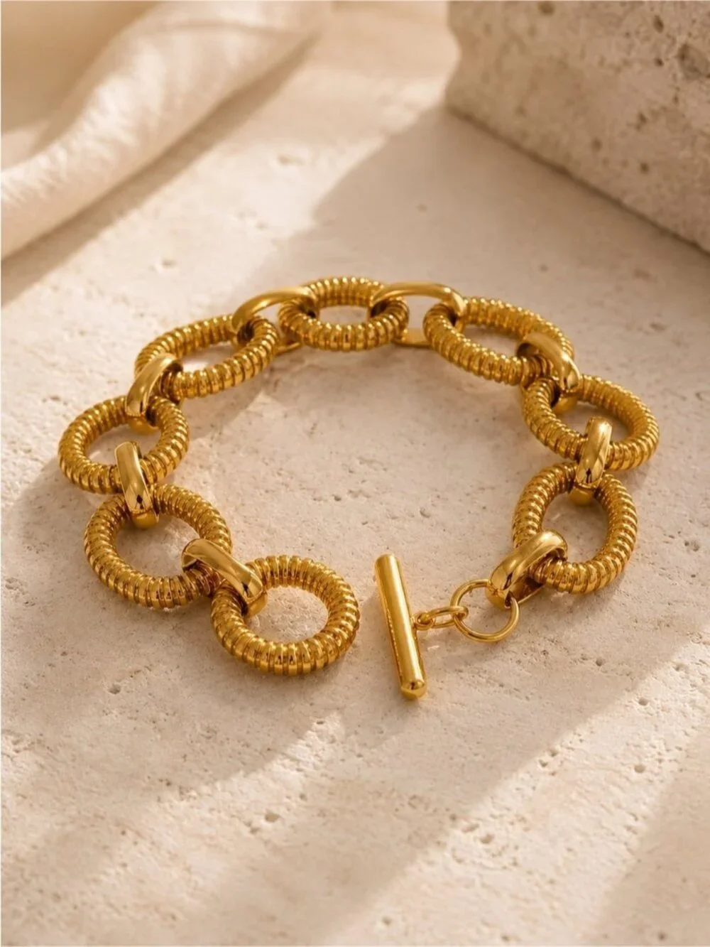 Textured Gold tone Link Toggle Bracelet